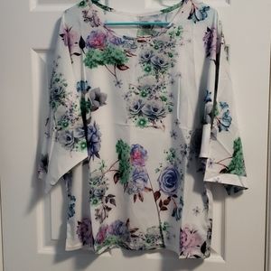 White floral patterned blouse